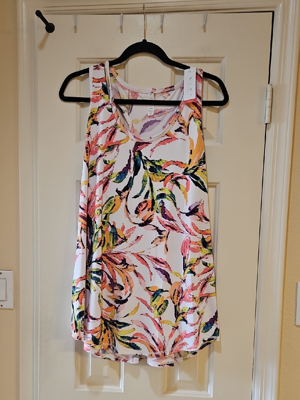 NWT Lane Bryant White Tank Top with Pink, Yellow, Green and Blue Leaf Print.